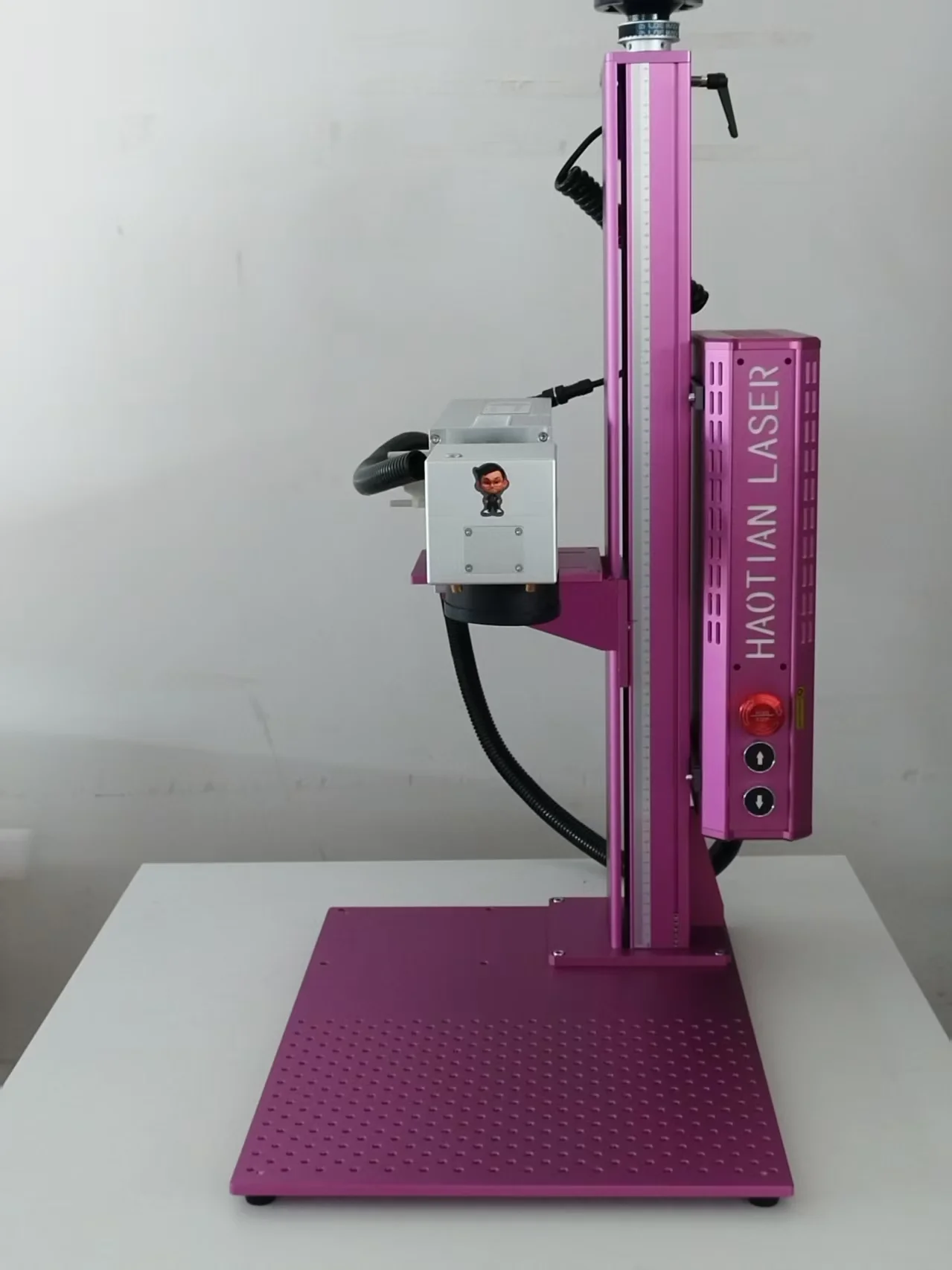 Custom pink 50W JPT M8 MOPA fiber laser made to order by Haotian Laser