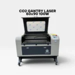 Front view of a Hao Tian CO2 Gantry Laser machine with the top lid open, showcasing the 60x90 cm work area and honeycomb bed.