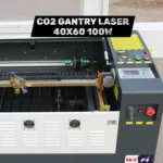Internal view of the 40x60 laser work area and digital control interface for industrial CO2 gantry laser.