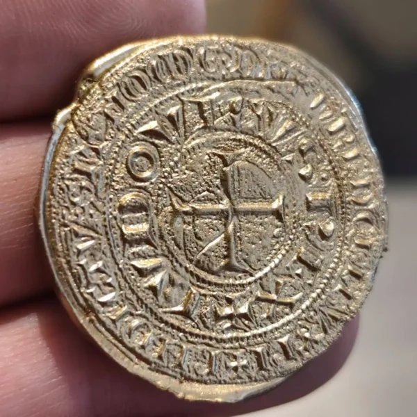 Brass coin with deep 3D relief medieval cross made with a 100W JPT M7 fiber laser