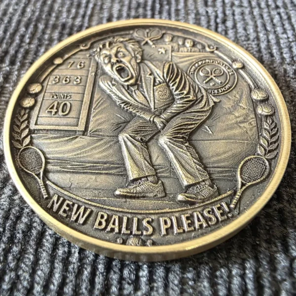 Brass coin with humorous 3D relief tennis scene and New Balls Please lettering engraved with 100W JPT M7 MOPA fiber laser