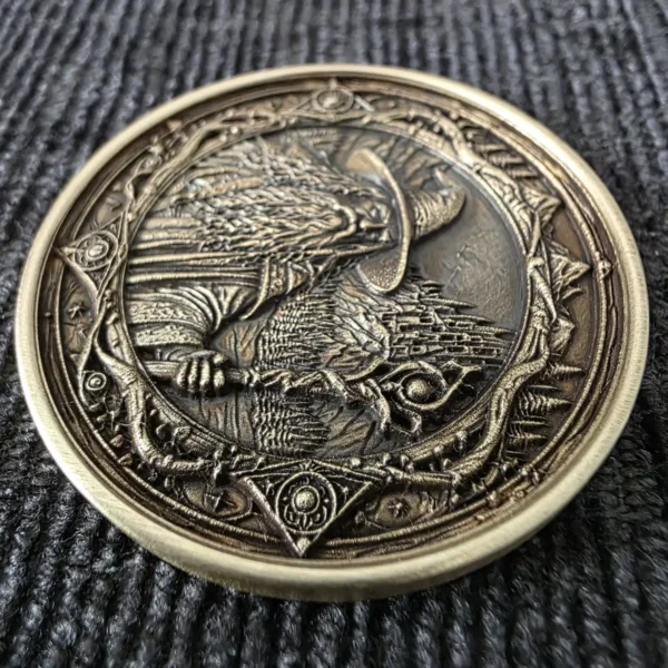 Side view of a brass coin showing the depth of a 3D relief wizard engraved with 100W JPT M7 MOPA fiber laser