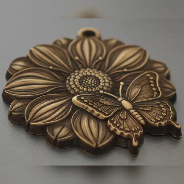 Brass pendant with layered 3D relief flower and butterfly engraved with 60W JPT EM7 MOPA fiber laser