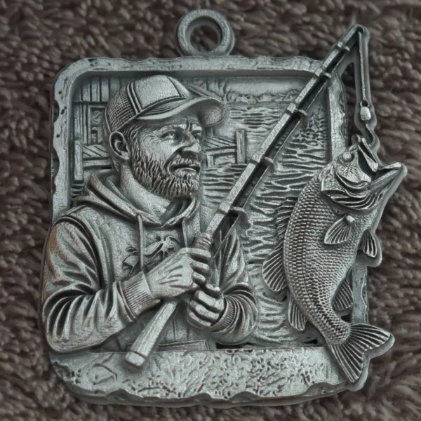 Steel pendant with 3D relief fisherman holding a bass on the line, engraved with 60W JPT EM7 MOPA fiber laser