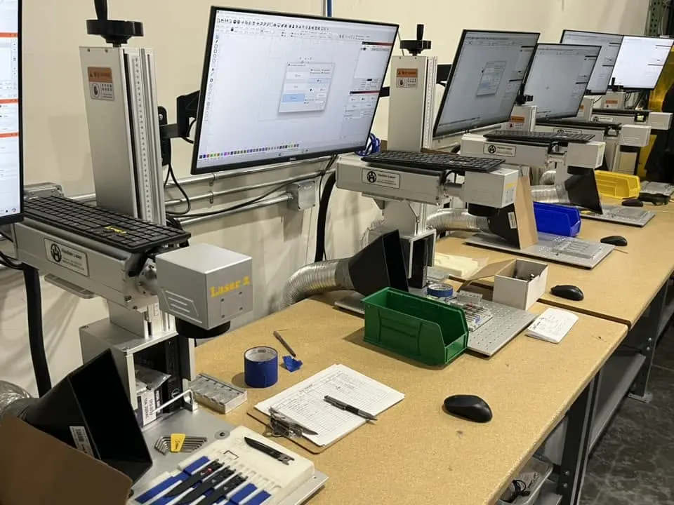 Production line of Haotian fiber lasers marking metal parts at a customer facility