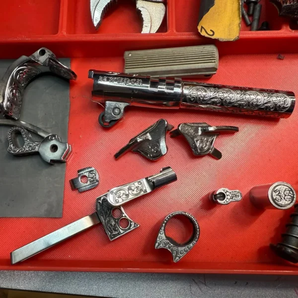 Engraved pistol barrel, hammer and small parts finished with 100W JPT M7 MOPA fiber laser