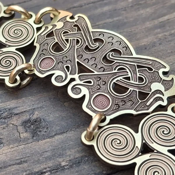Brass bracelet with Celtic spiral and knotwork links cut and engraved with 100W JPT M7 MOPA fiber laser