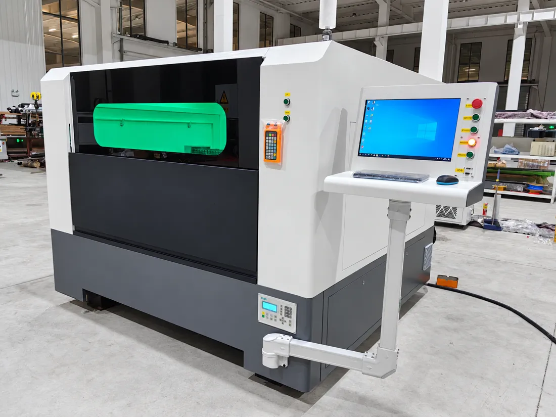 Enclosed Haotian CNC fiber laser machine with touchscreen control panel