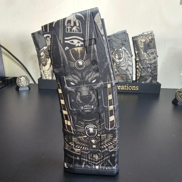 Polymer magazine engraved with an Egyptian Anubis design and hieroglyphs using 60W JPT EM7 MOPA fiber laser